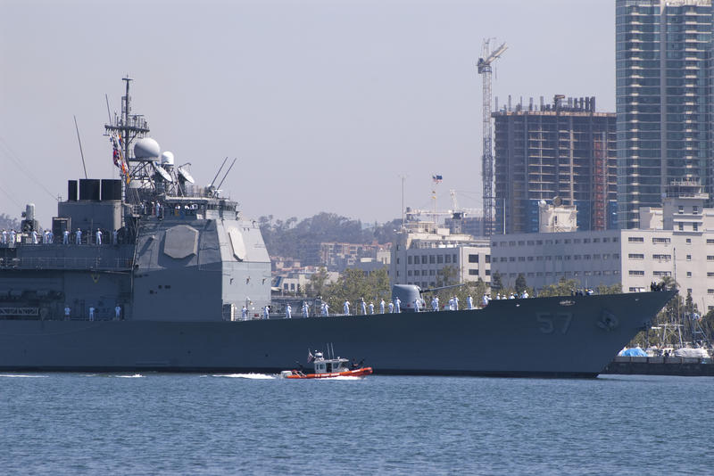 the guided missile destroyer Mitscher in the port of san diego